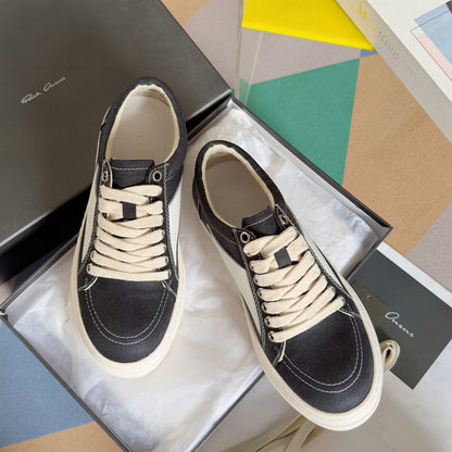 Rick Owens Canvas Low-top Sneakers - Black Unisex Streetwear Limited Edition - **Rick Owens Black Canvas Low-Top Sneakers: Modern Minimalism and Superior Craftsmanship** Introducing the Rick Owens