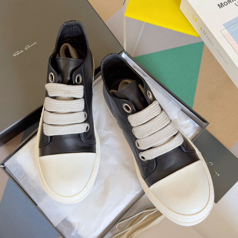 Rick Owens Low-top Sneakers - Black Unisex Streetwear Limited Edition - **Rick Owens Black Low-Top Sneakers: Modern Elegance and Superior Craftsmanship** Introducing the Rick Owens Black