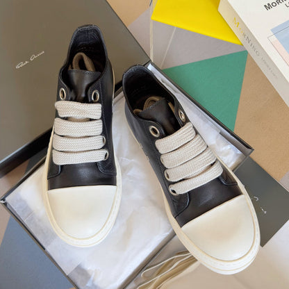 Rick Owens Low-top Sneakers - Black Unisex Streetwear Limited Edition - **Rick Owens Black Low-Top Sneakers: Modern Elegance and Superior Craftsmanship** Introducing the Rick Owens Black