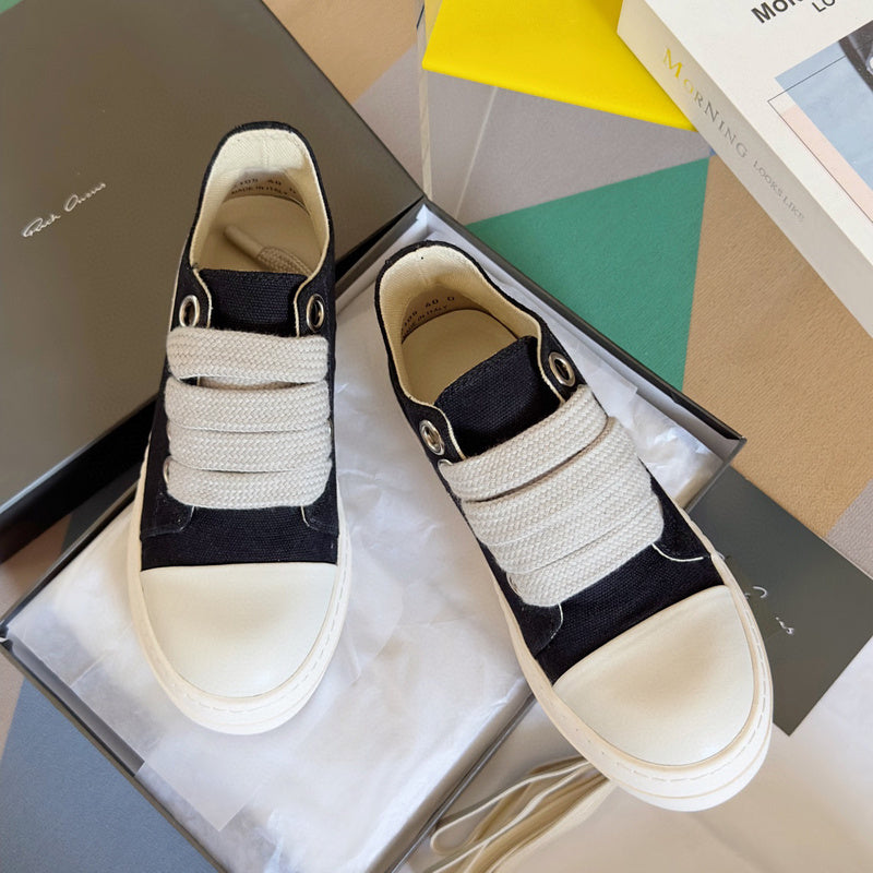 Rick Owens Canvas Low-top Sneakers - Black Unisex Streetwear Limited Edition - **Rick Owens Black Canvas Low-Top Sneakers: Modern Minimalism with Superior Craftsmanship** Introducing the Rick Owens