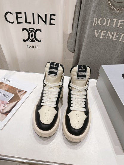 Rick Owens High-top Sneakers - Black Unisex Streetwear Limited Edition - **Rick Owens High-Top Sneakers: Dual-Tone Elegance and Craftsmanship** Step up your fashion game with Rick
