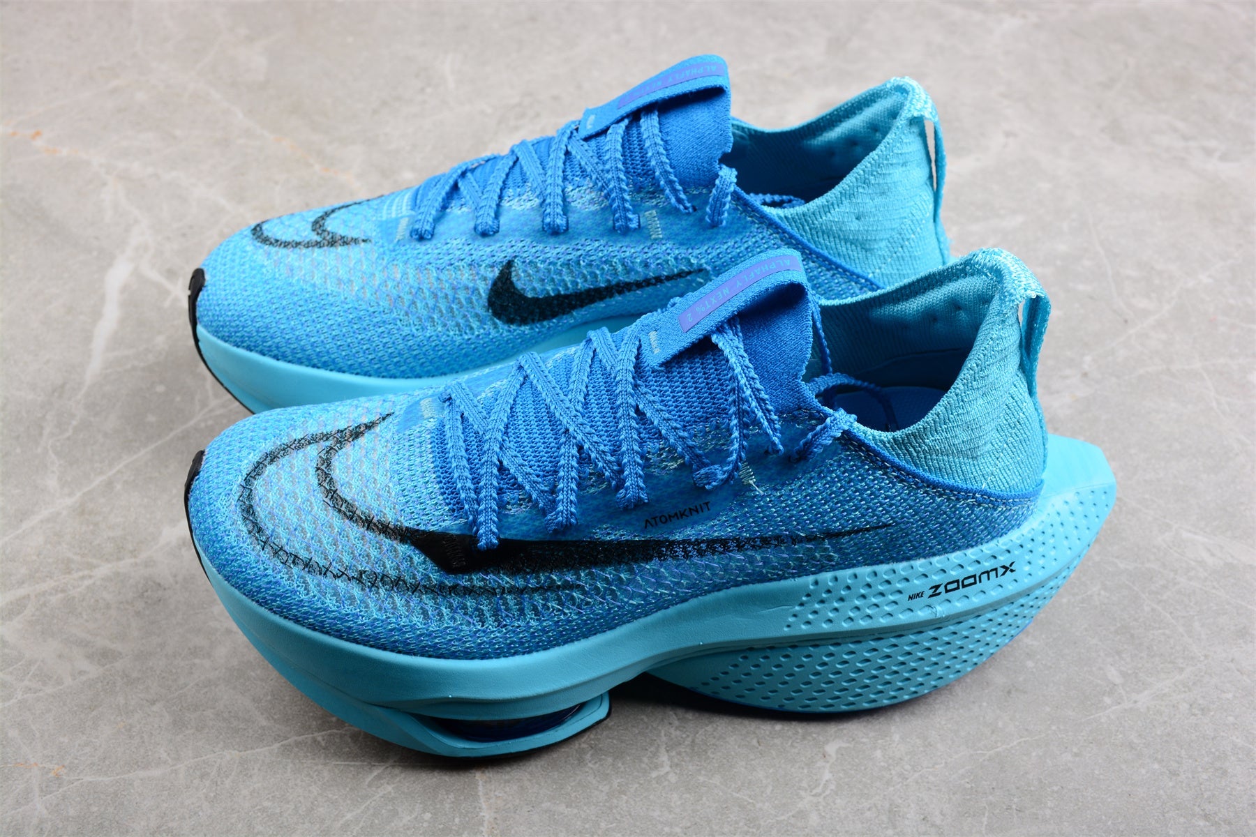 Zoom Alphafly Ne - T% 2 - Blue Unisex Streetwear Limited Edition - The Nike Air Zoom Alphafly NEXT% 2 is a top-tier running shoe engineered for athletes