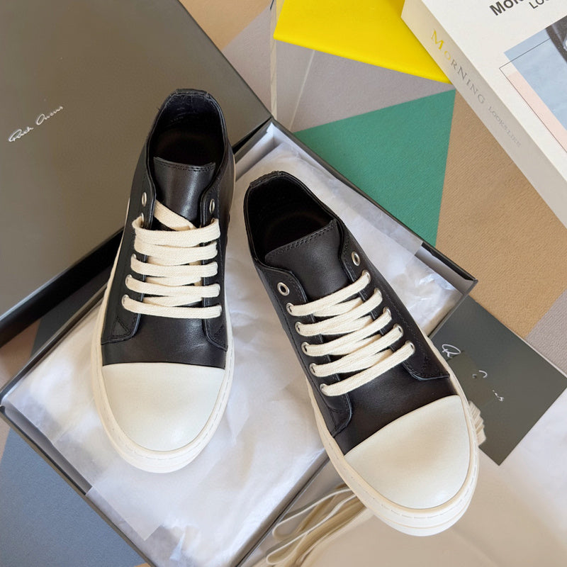 Rick Owens Low-top Sneakers - Black Unisex Streetwear Limited Edition - **Rick Owens Black Low-Top Sneakers: Avant-Garde Elegance and Comfort** Step into the future of fashion