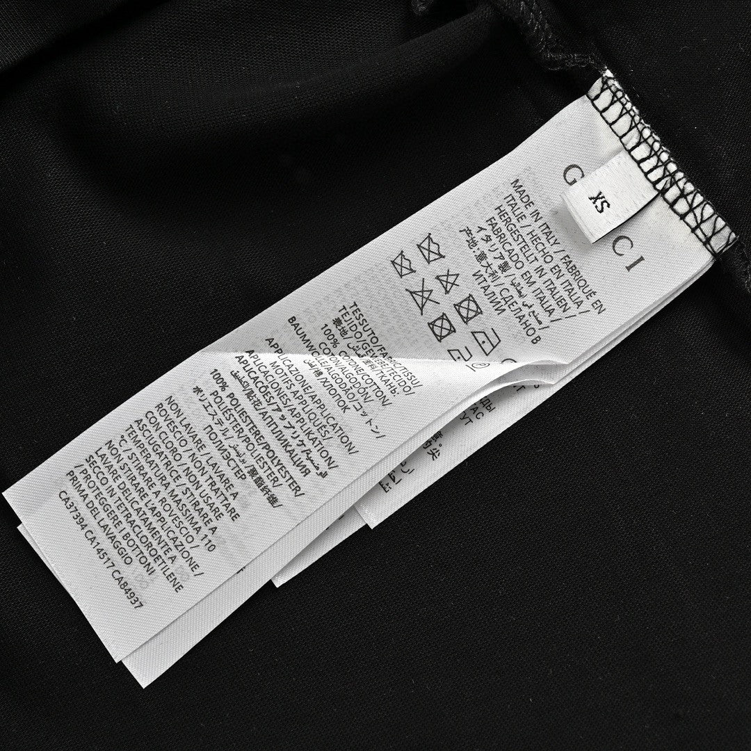 Camiseta Gucci con carita sonriente