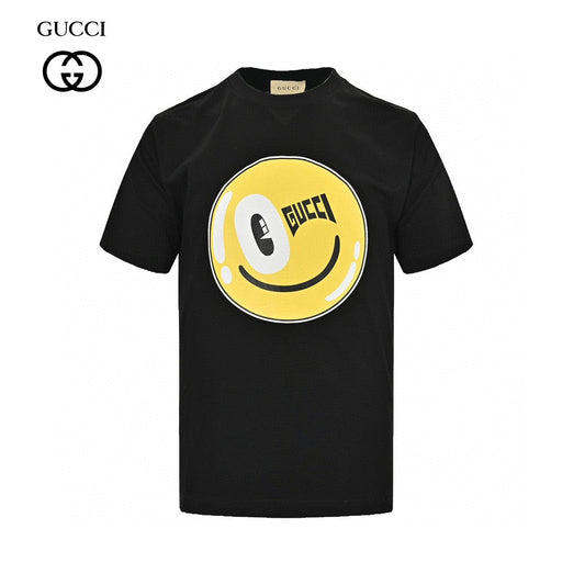 Gucci Smiley Face T-shirt - Black Unisex Streetwear Limited Edition - <span>This Gucci t-shirt features a playful design with a large yellow smiley face graphic on
