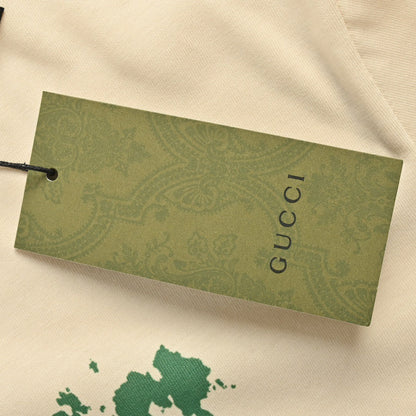 Camiseta Gucci con logo salpicado (Beige)