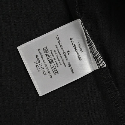 Camiseta Dior negra y marrón.