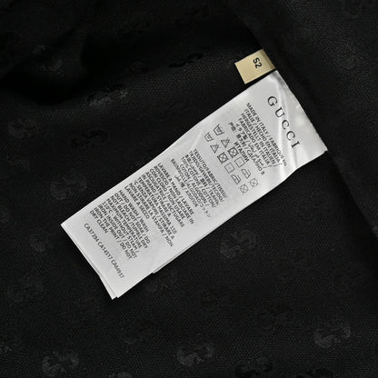 Camisa negra de manga corta con monograma GG de Gucci
