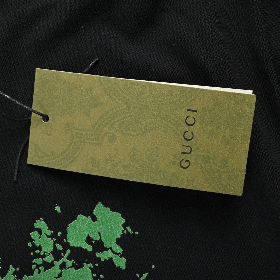 Camiseta Gucci con logo salpicado (negra)