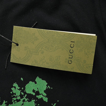 Camiseta Gucci con logo salpicado (negra)