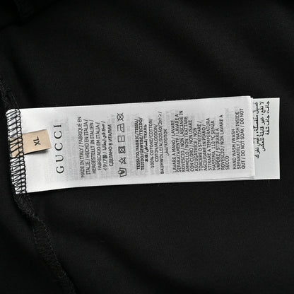 Camiseta Gucci con logo de fresa (negra)