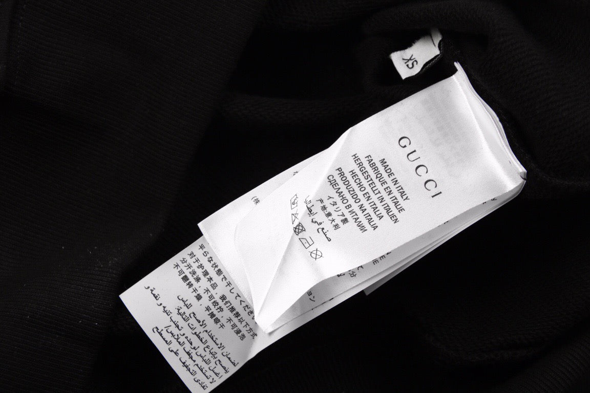 Sudadera negra Gucci con estampado de bailarinas