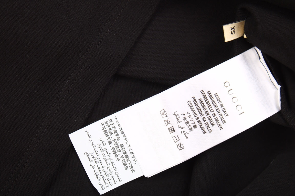 Camiseta negra con el logo del rayo de Gucci