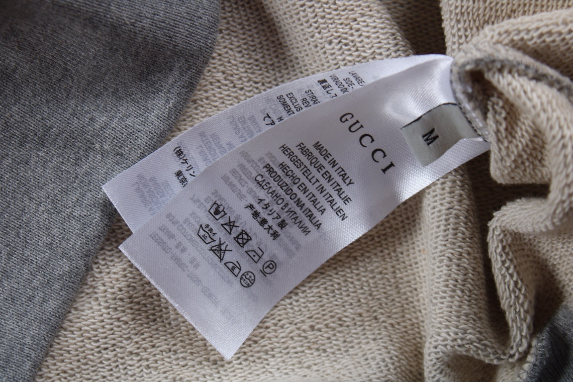Sudadera gris Gucci con detalle de rayas