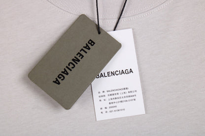 CAMISETA GRIS CON LOGOTIPO DE BALENCIAGA