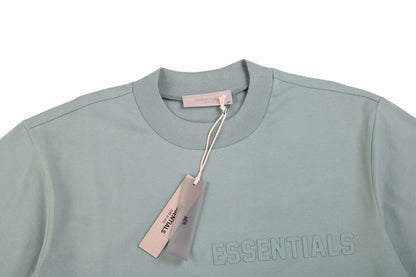 Fear Of God Essentials T-shirt - Green Unisex Streetwear Limited Edition - <p dir='ltr'><span>A minimalist Fear of God Essentials t-shirt. Light green color with 'ESSENTIALS' text