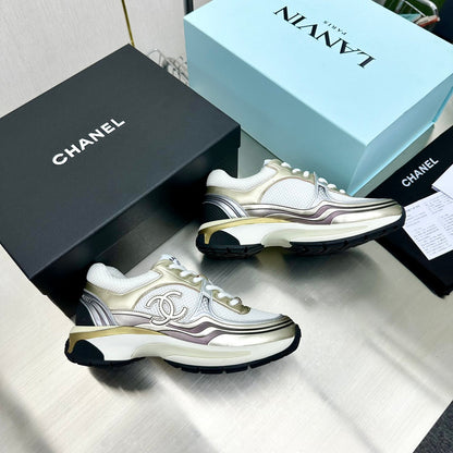 CHANEL Cc Runners Sneakers And Gold - White Unisex Streetwear Limited Edition - The CHANEL CC RUNNERS SNEAKERS WHITE &amp; GOLD - REPLICA bring together luxury, elegance, and