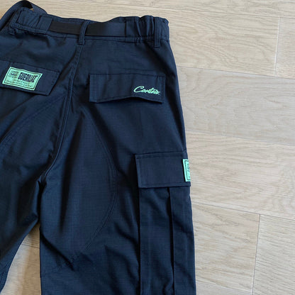 CORTEIZ Alcatraz Cargo Pants - Green - Black Unisex Streetwear Limited Edition - The CORTEIZ ALCATRAZ CARGO PANTS BLACK/GREEN - REPLICA deliver bold streetwear energy and practical design.