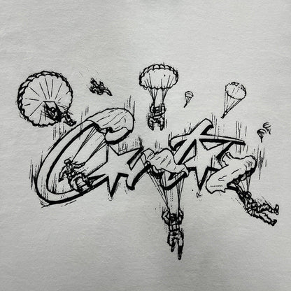 CORTEIZ Allstarz Skydiver Tee T-Shirt - White Unisex Streetwear Limited Edition - The CORTEIZ ALLSTARZ SKYDIVER TEE WHITE - REPLICA combines bold graphics with sleek streetwear style.