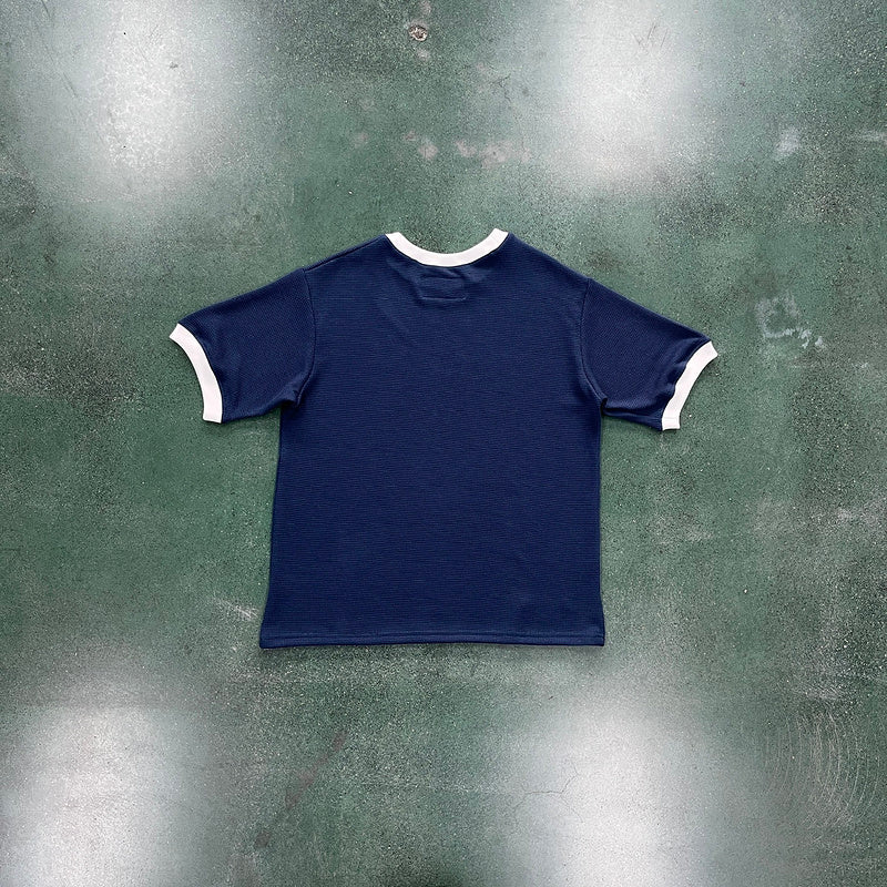 CORTEIZ Insignia Waffle Tee T-Shirt - Navy Unisex Streetwear Limited Edition - The CORTEIZ INSIGNIA WAFFLE TEE NAVY - REPLICA blends premium comfort with sleek streetwear style.