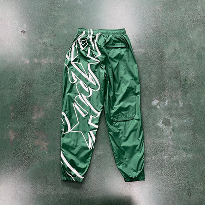 CORTEIZ Megashuku Joggers Jogger Pants - Green Unisex Streetwear Limited Edition - The CORTEIZ MEGASHUKU JOGGERS GREEN - REPLICA combine bold streetwear design with unmatched comfort. Crafted
