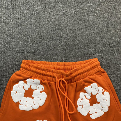 DENIM Tears Cotton Wreath Shorts - Orange Unisex Streetwear Limited Edition - The DENIM TEARS COTTON WREATH SHORTS ORANGE - REPLICA fuse vibrant style with cultural storytelling,