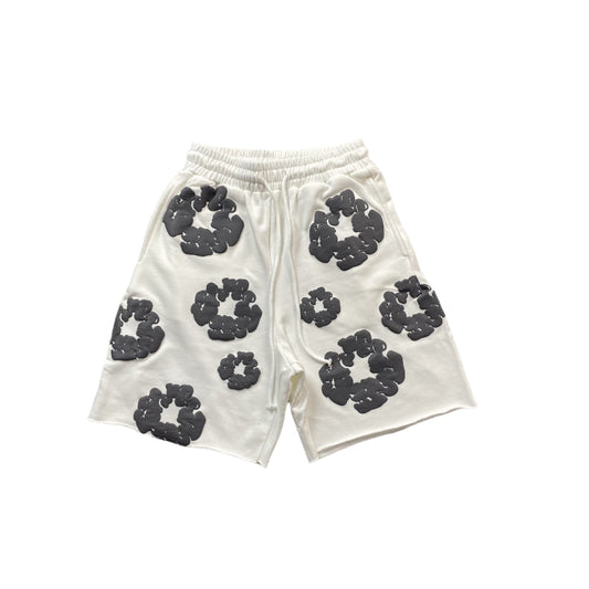 DENIM Tears Cotton Wreath Shorts - White Unisex Streetwear Limited Edition - The DENIM TEARS COTTON WREATH SHORTS WHITE - REPLICA offer a fresh and clean take