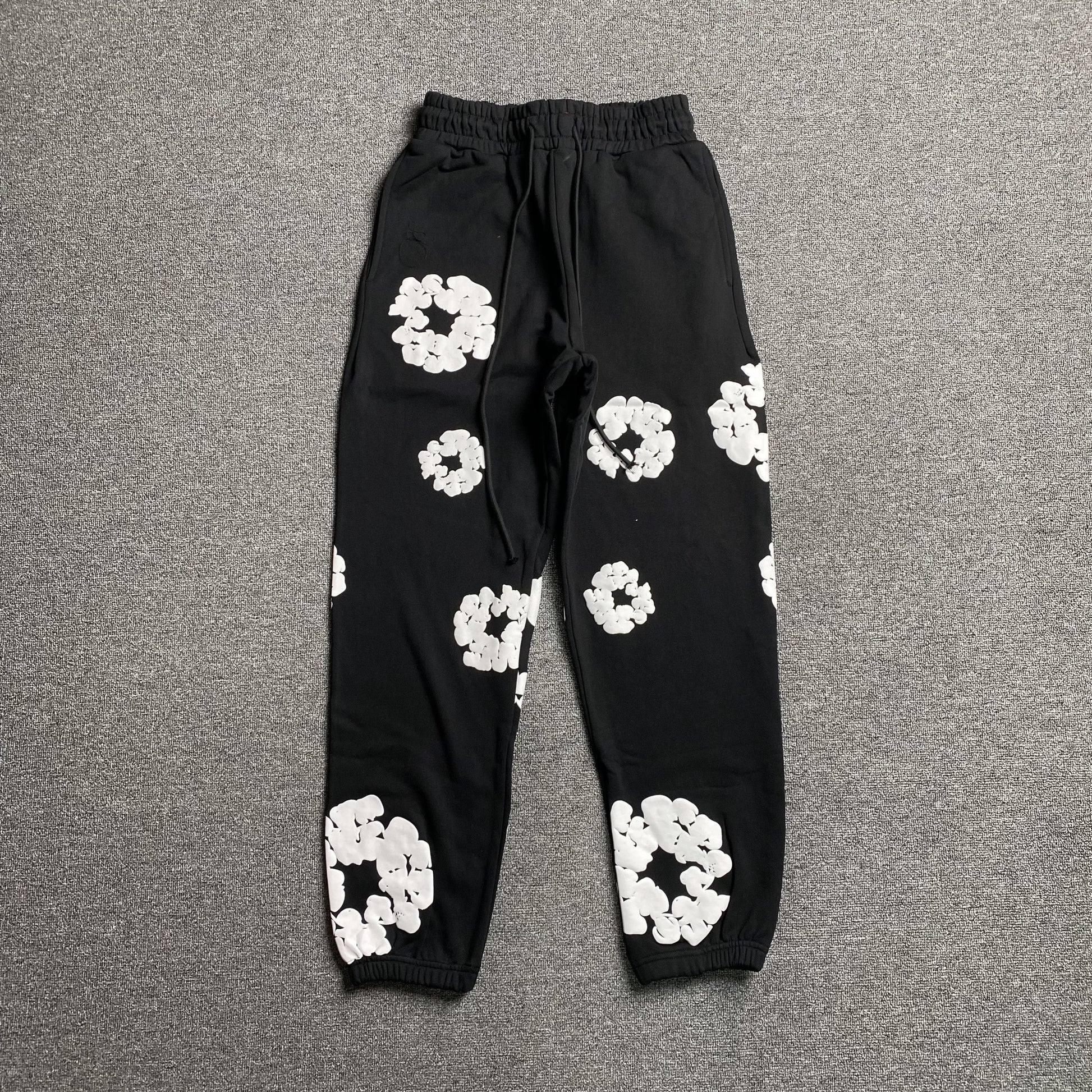 DENIM Tears Cotton Wreath Sweatpants - Black Unisex Streetwear Limited Edition - The Denim Tears Cotton Wreath Sweatpants Black Replica deliver the perfect balance of comfort and