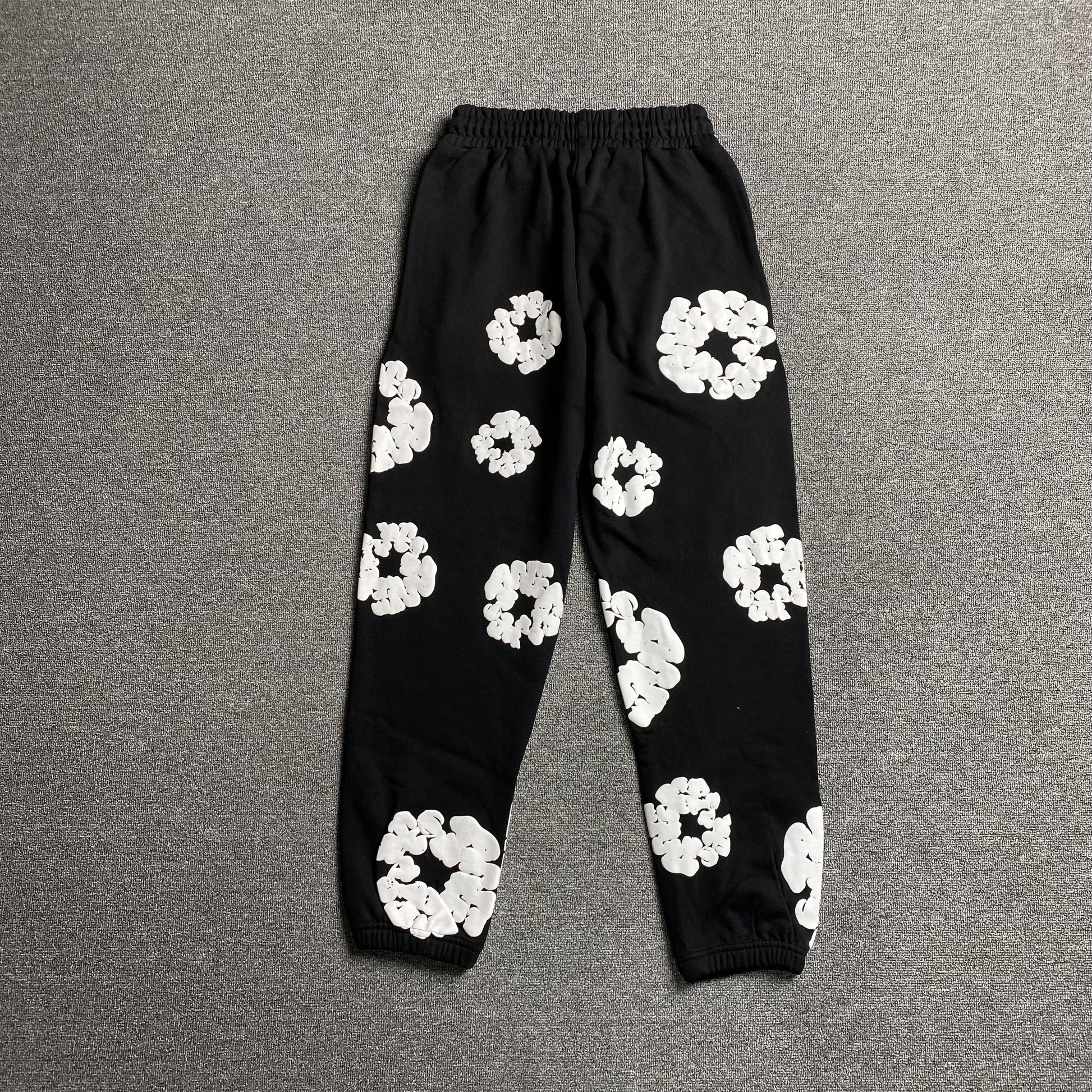 DENIM Tears Cotton Wreath Sweatpants - Black Unisex Streetwear Limited Edition - The Denim Tears Cotton Wreath Sweatpants Black Replica deliver the perfect balance of comfort and