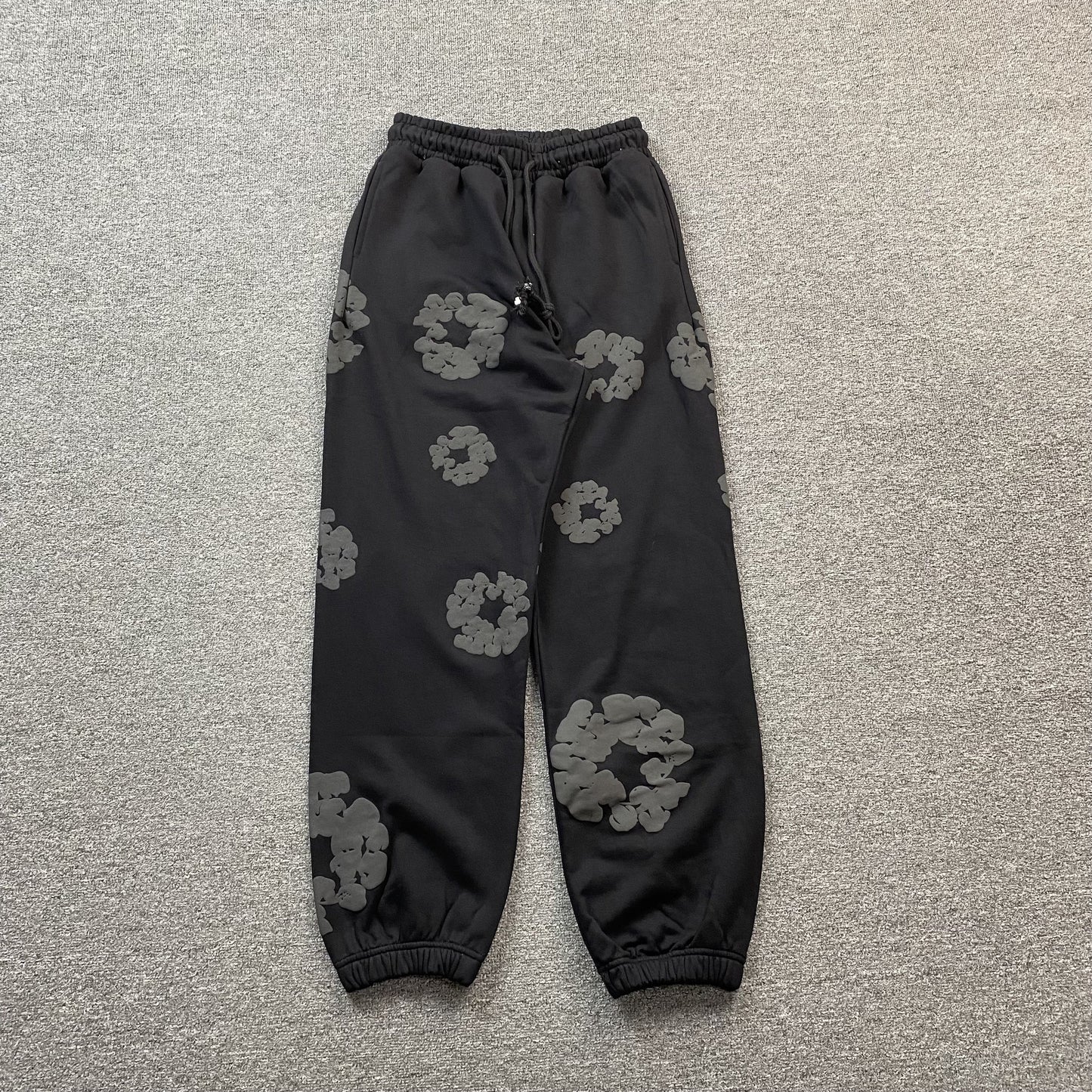 DENIM Tears Cotton Wreath Sweatpants Monochrome - Black Unisex Streetwear Limited Edition - The Denim Tears Cotton Wreath Sweatpants Monochrome Black Replica deliver the perfect balance of comfort
