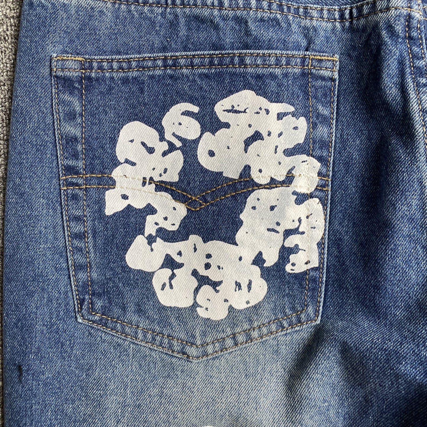 DENIM TEARS x LEVI'S COTTON WREATH JEANS AZULES