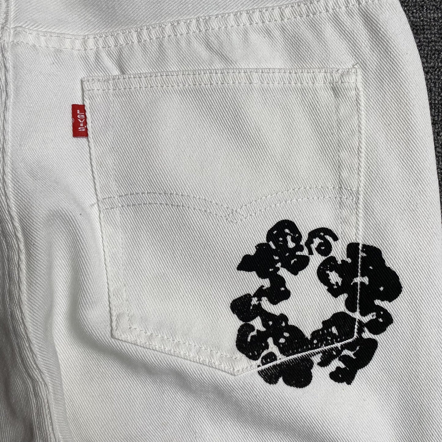 JEANS DENIM TEARS x LEVI'S COTTON WREATH BLANCOS