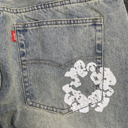 DENIM TEARS x LEVI'S DIRTY WASH WREATH JEANS LAVADO CLARO