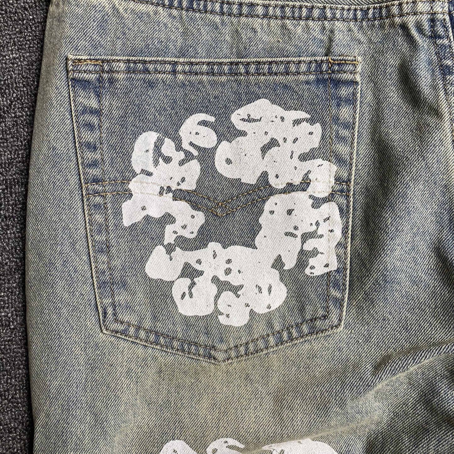 DENIM TEARS x LEVI'S DIRTY WASH WREATH JEANS LAVADO CLARO