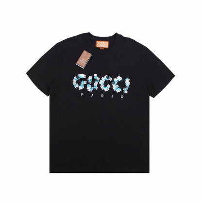 GUCCI - Balenciaga Flower Logo T-shirt - Black Unisex Streetwear Limited Edition - The GUCCI x BALENCIAGA FLOWER LOGO T-SHIRT BLACK - REPLICA is a striking blend of