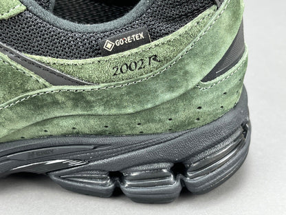 JJJJOUND - New Balance 2002r Gore-te - Pine - Green Unisex Streetwear Limited Edition - The JJJJOUND x NEW BALANCE 2002R GORE-TEX PINE - REPLICA combines minimalist aesthetics with rugged