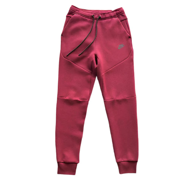NIKE Tech Fleece Pants - Burgundy - Red Unisex Streetwear Limited Edition - The NIKE TECH FLEECE PANTS BURGUNDY - REPLICA bring together modern athletic performance and bold