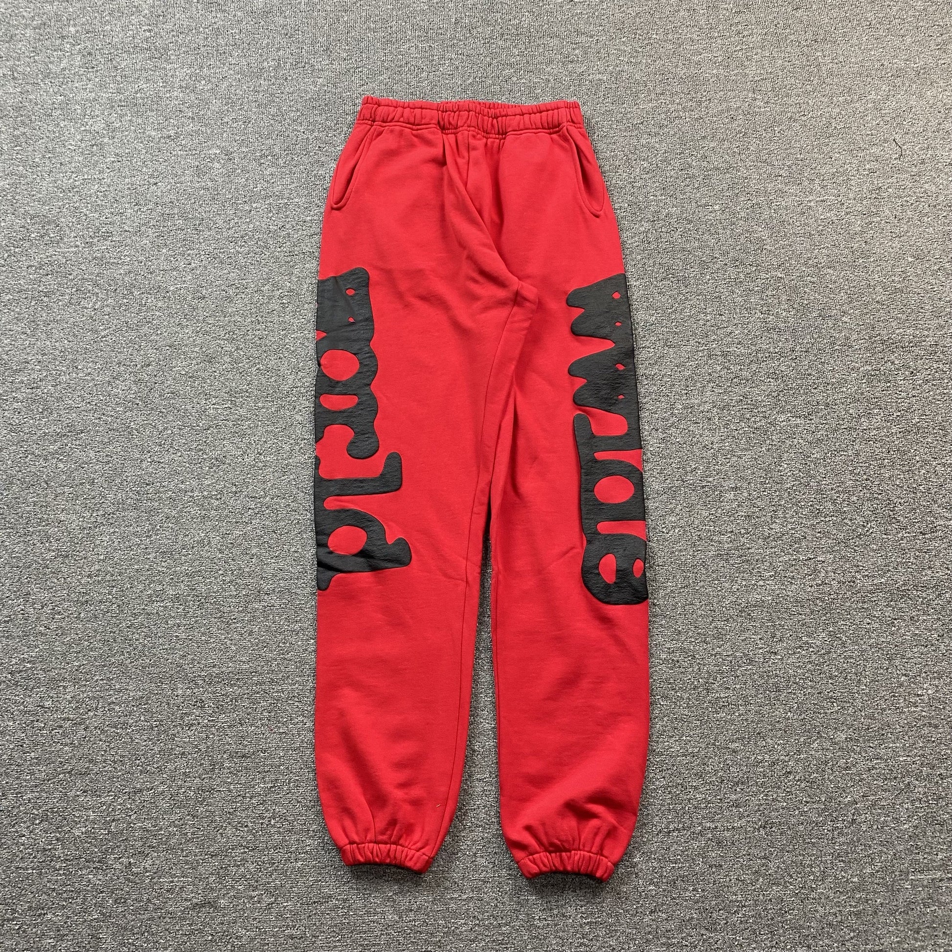 SP5DER Beluga Sweatpants - Red Unisex Streetwear Limited Edition - The SP5DER BELUGA SWEATPANTS RED - REPLICA bring bold streetwear energy with a standout design