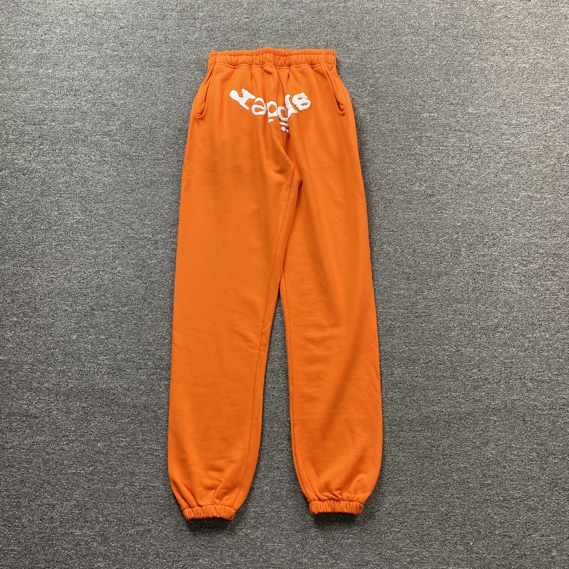 SP5DER Legacy Sweatpants - Orange Unisex Streetwear Limited Edition - The SP5DER LEGACY SWEATPANTS ORANGE - REPLICA are the perfect fusion of bold streetwear aesthetics