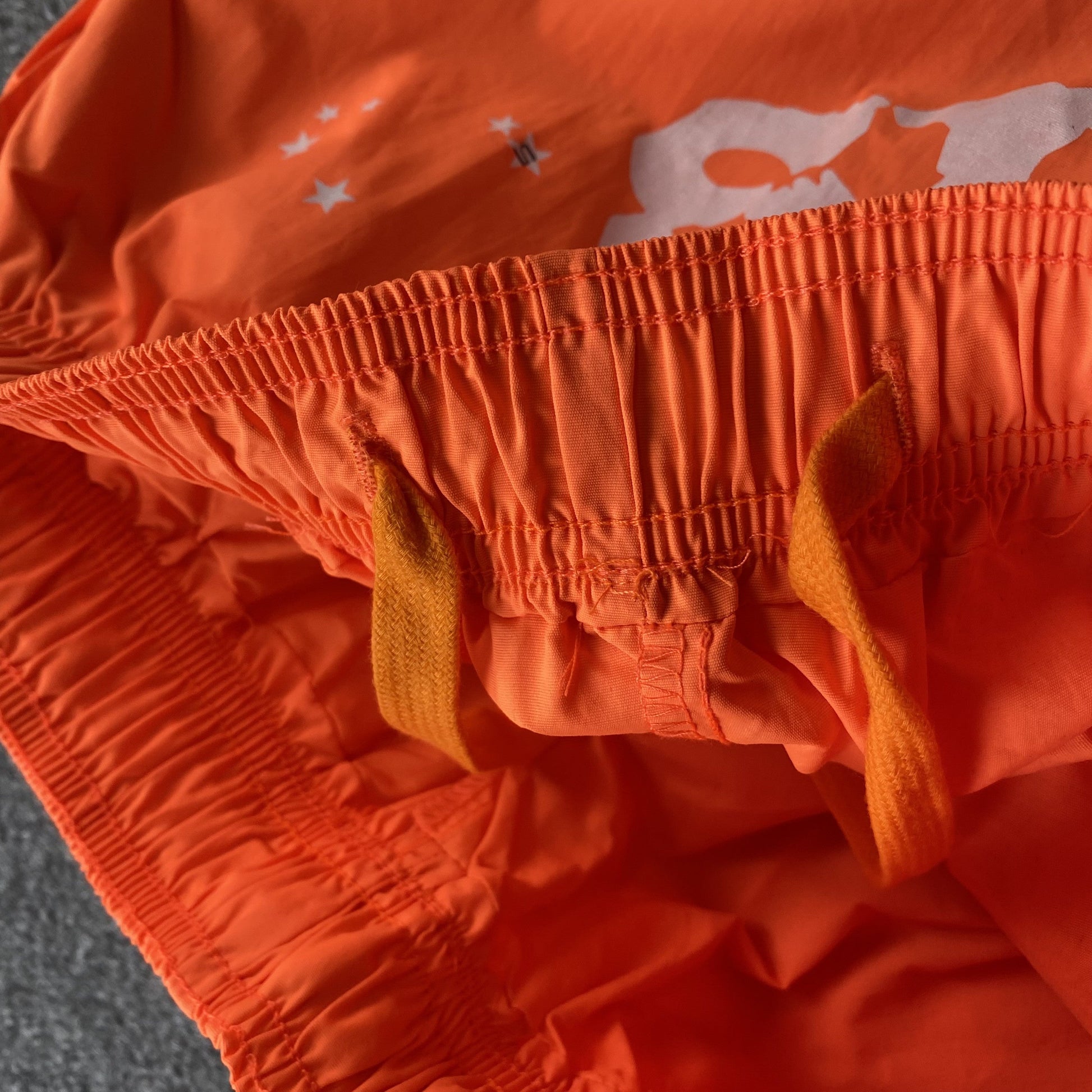 SP5DER Og Web Double Layer Short Shorts - Orange Unisex Streetwear Limited Edition - The SP5DER OG WEB DOUBLE LAYER SHORT ORANGE - REPLICA brings bold energy and unique