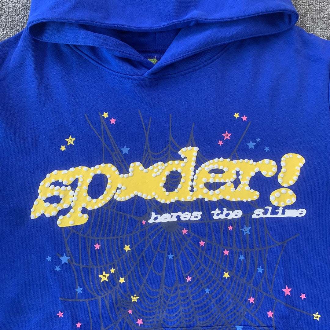 SP5DER Tc Hoodie - Blue Unisex Streetwear Limited Edition - The SP5DER TC HOODIE BLUE - REPLICA combines sleek streetwear aesthetics with bold design elements