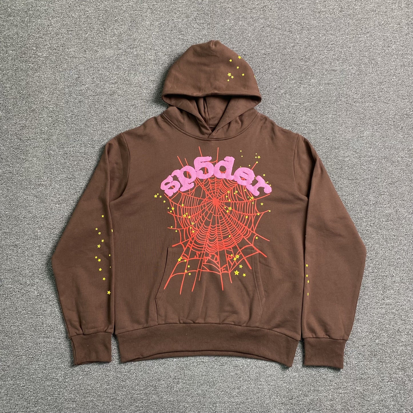 SP5DER Web Hoodie - Brown Unisex Streetwear Limited Edition - The SP5DER WEB HOODIE BROWN - REPLICA combines earthy tones with bold streetwear energy, making