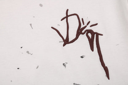 Camiseta Dior con logo marrón