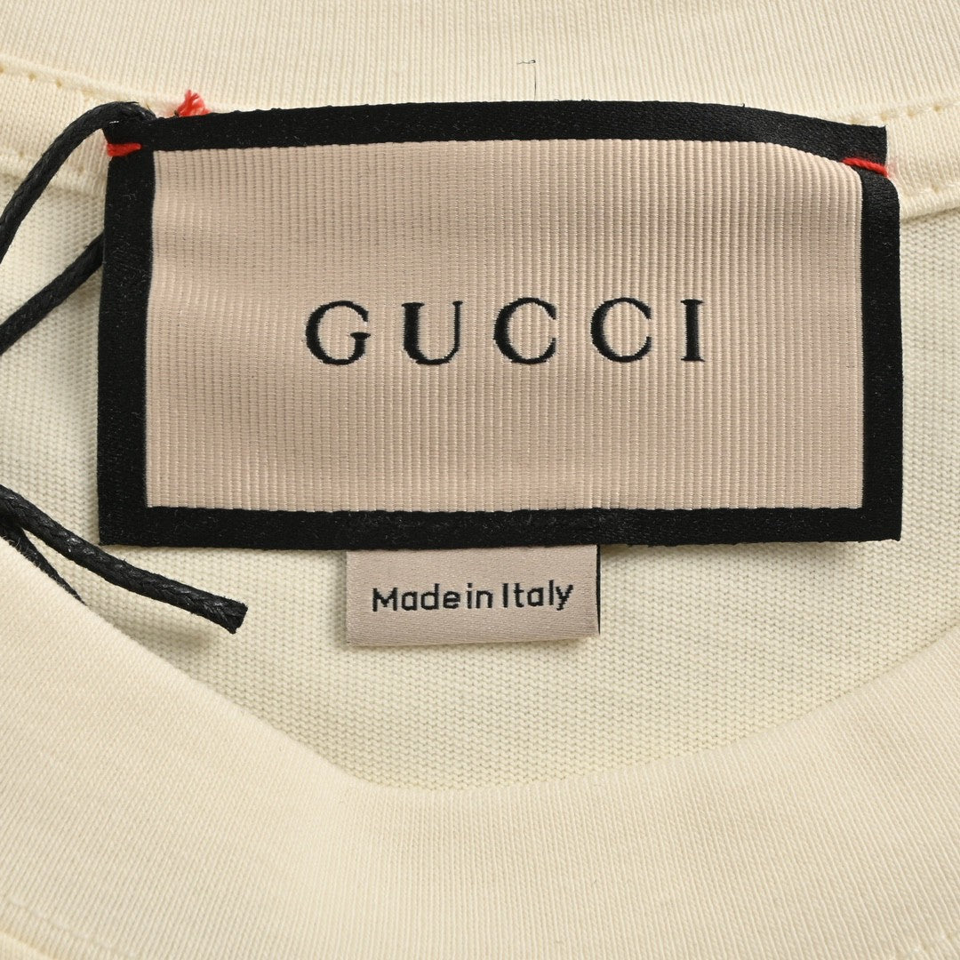 Camiseta Gucci color crema con dibujo de dragón