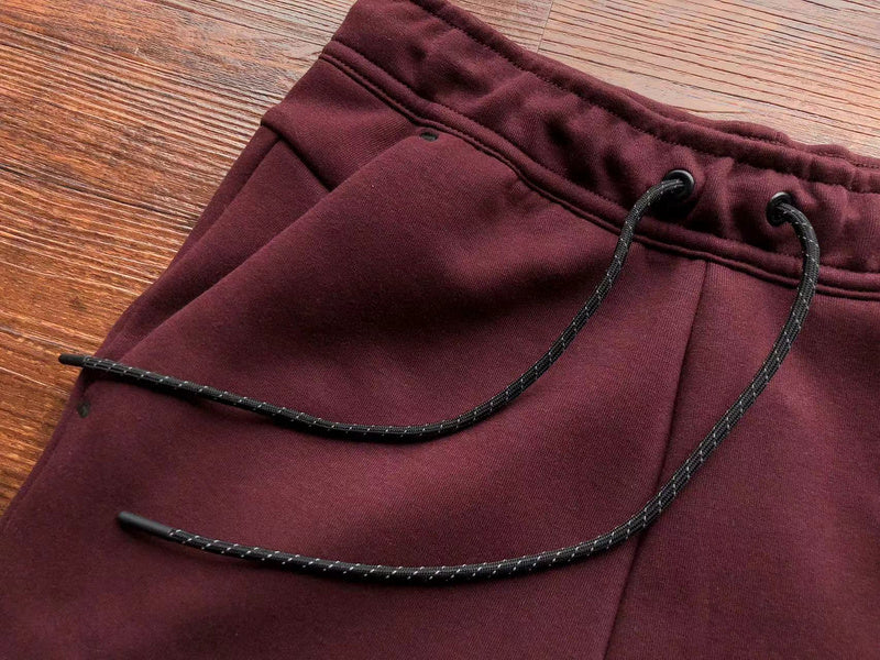 NIKE Tech Fleece Pants - Berry - Pomegranate - Red Unisex Streetwear Limited Edition - The NIKE TECH FLEECE PANTS BERRY/POMEGRANATE - REPLICA combine modern athletic performance with a bold,