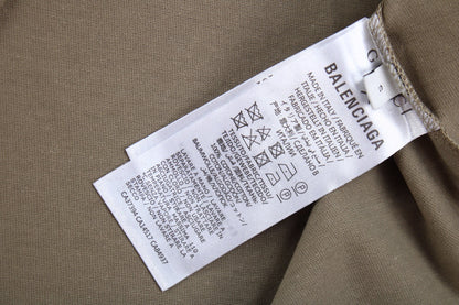 Camiseta GUCCI x BALENCIAGA con logo floral color caqui