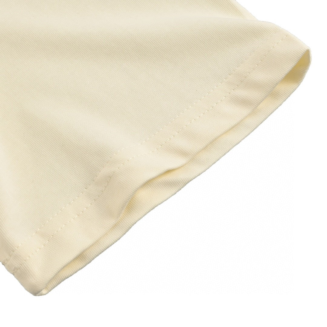 Camiseta Gucci color crema con estampado de oso