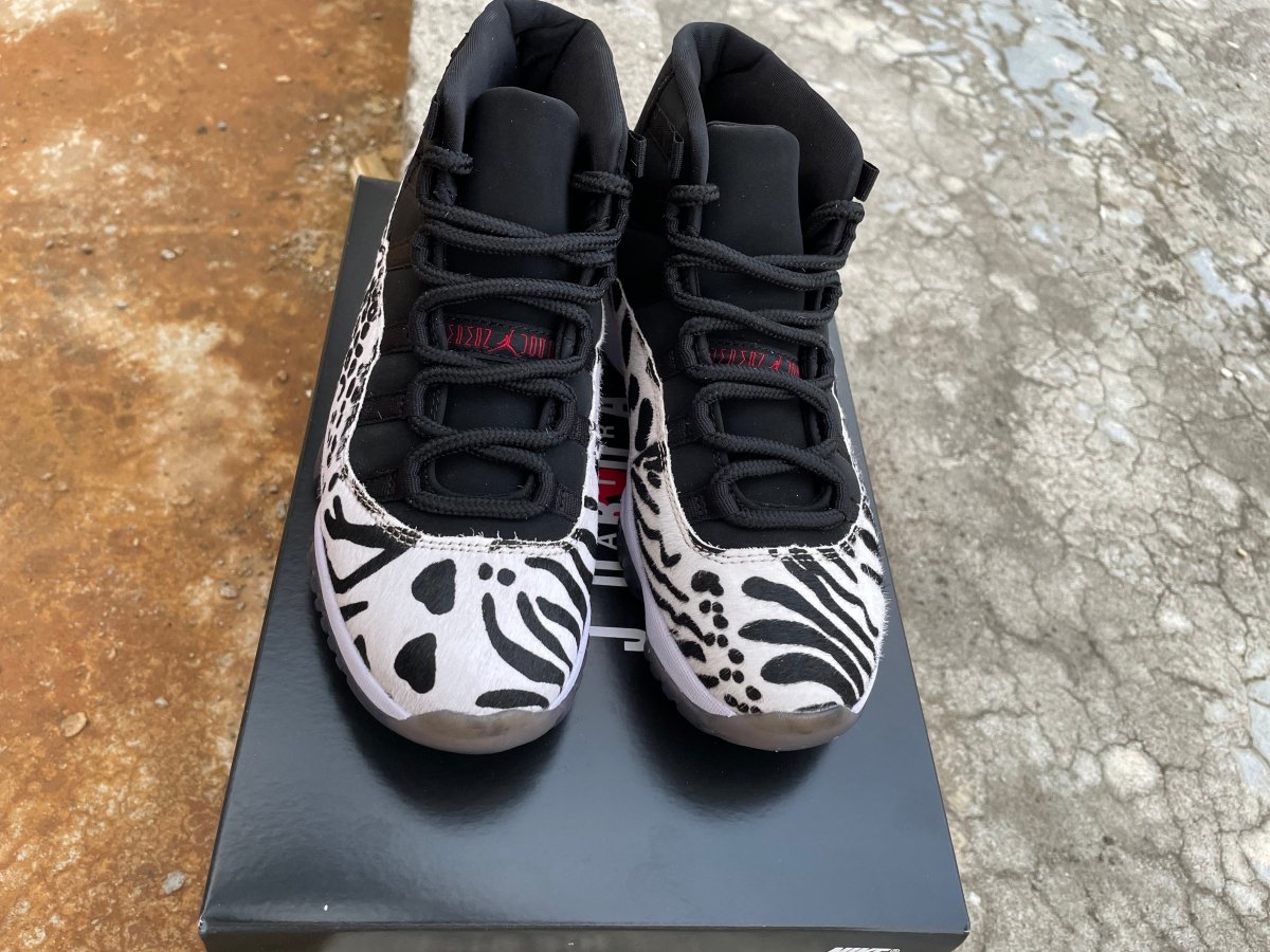 AIR Jordan 11 'animal Instinct' - Black Unisex Streetwear Limited Edition - **Air Jordan 11 'Animal Instinct'** The Air Jordan 11 'Animal Instinct' is a bold and