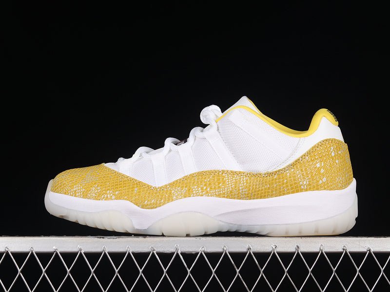 AIR Jordan 11 Low Yellow Snakeskin Sneakers - White Unisex Streetwear Limited Edition - Embrace bold sophistication with the Air Jordan 11 Low Yellow Snakeskin White/Tour Yellow/Sail, a striking