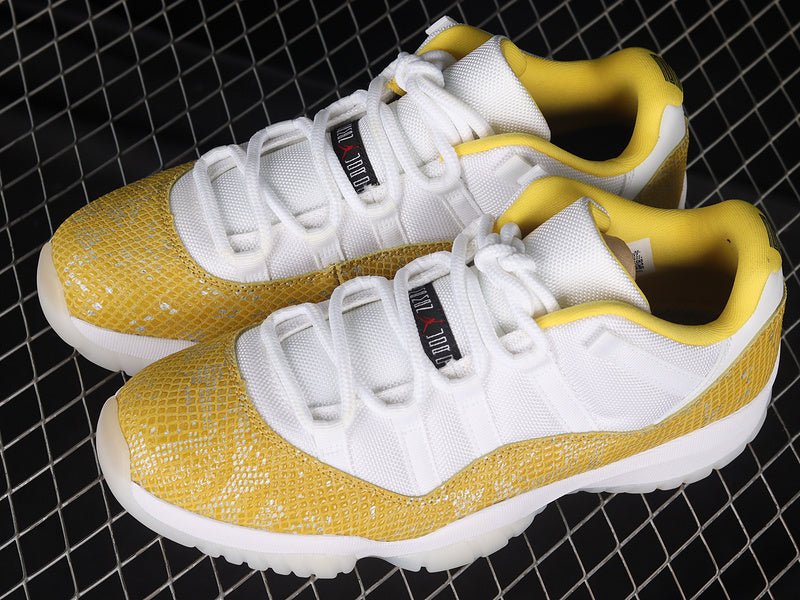 AIR Jordan 11 Low Yellow Snakeskin Sneakers - White Unisex Streetwear Limited Edition - Embrace bold sophistication with the Air Jordan 11 Low Yellow Snakeskin White/Tour Yellow/Sail, a striking